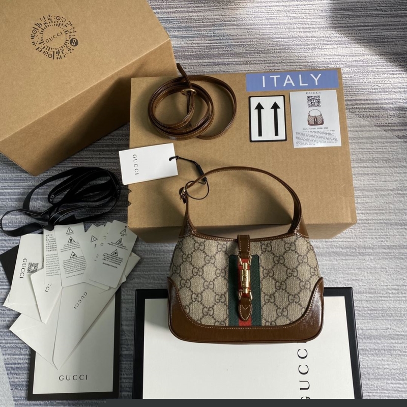 G*u*i top handle bags